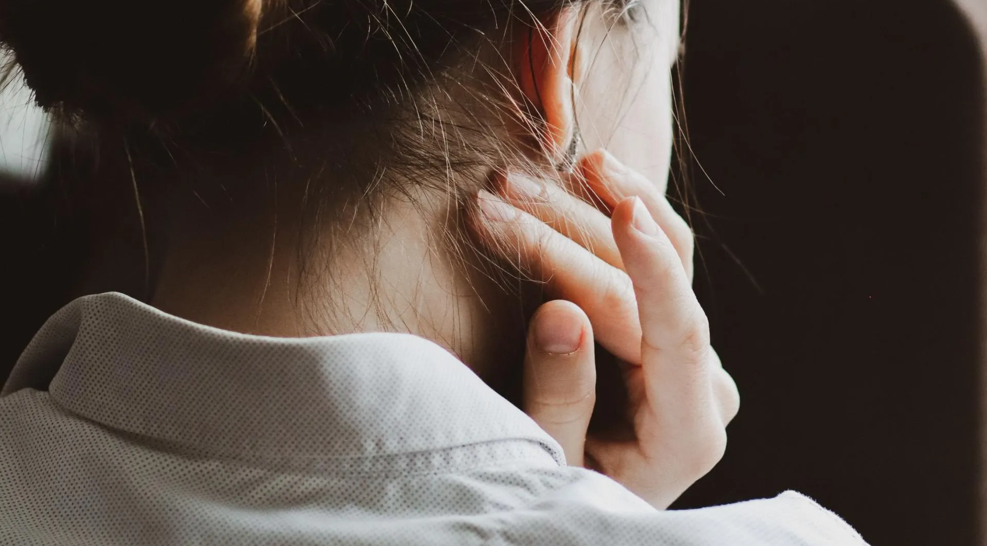 Woman Suffering from Neck Pain