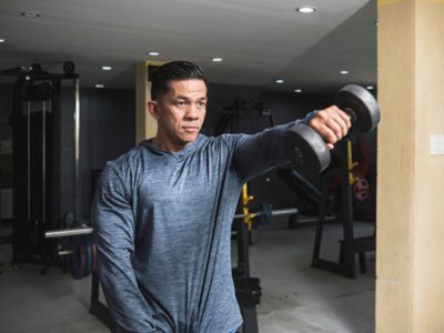 A,Fit,Asian,Man,In,A,Sweatshirt,Does,Alternating,Dumbbell A,Fit,Asian,Man,In,A,Sweatshirt,Does,Alternating,Dumbbell